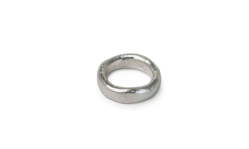 Silver ring on a white background